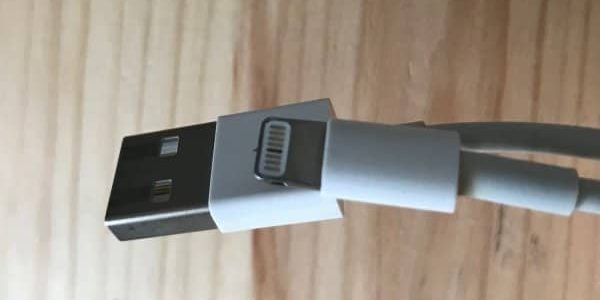 Clean iPhone cable or port to fix intermittent charging 